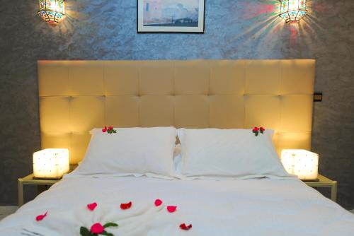 Postel nebo postele na pokoji v ubytování Appart-Hotel Amina Resort