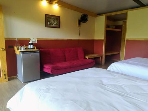 Cama o camas de una habitación en Hotel Pibi Boreal