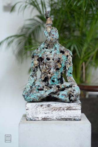 a statue of a person sitting on a rock at Prince of Galle (inside the Fort) in Galle