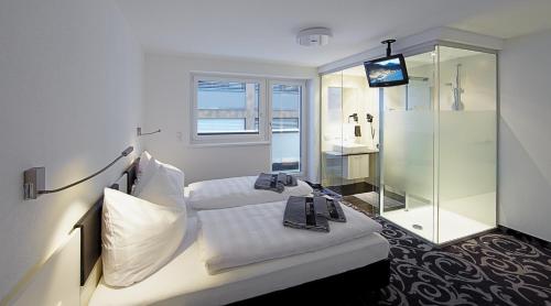 Posteľ alebo postele v izbe v ubytovaní Ischglliving Family Appartements
