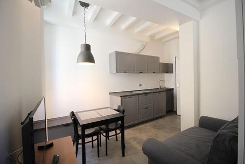 Kuchyň nebo kuchyňský kout v ubytování Piazza Trento 11