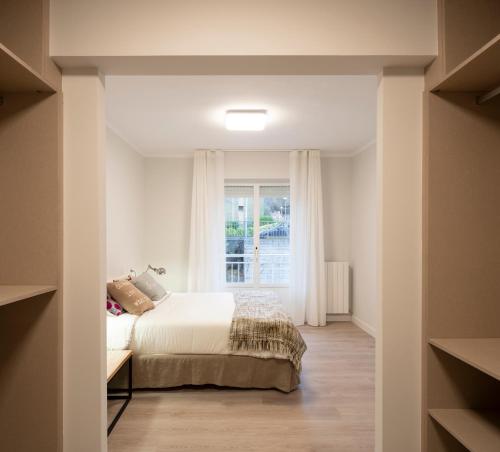 Ένα ή περισσότερα κρεβάτια σε δωμάτιο στο GORLIZ Apartment close to the BEACH & Parking