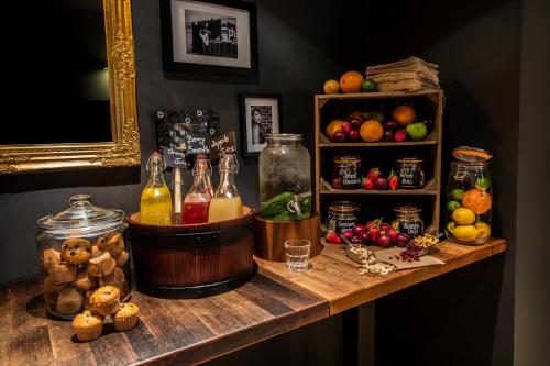 a kitchen counter filled with lots of fruit at pentahotel Birmingham in Birmingham