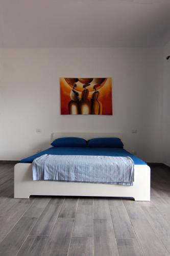 Ένα ή περισσότερα κρεβάτια σε δωμάτιο στο SGC Boa Vista Apartments