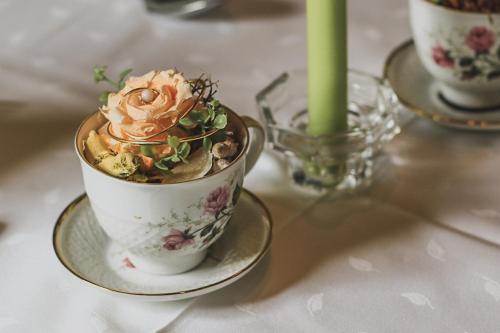 a cup of ice cream on a plate on a table at Gasthof Kornbachtal in Gefrees