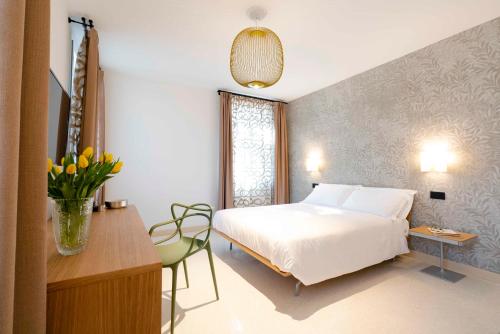 Posteľ alebo postele v izbe v ubytovaní Antica Pusterla Relais de Charme