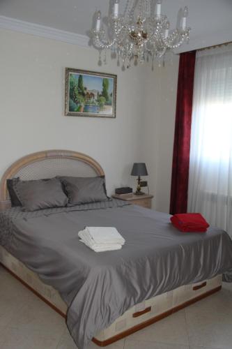A bed or beds in a room at B&b Casa Flamenca