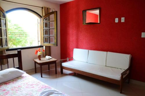 Кровать или кровати в номере Hotel Gramado da Serra