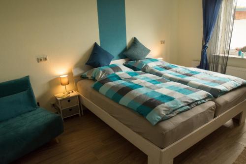 Ein Bett oder Betten in einem Zimmer der Unterkunft Ferienwohnung Frau Klara