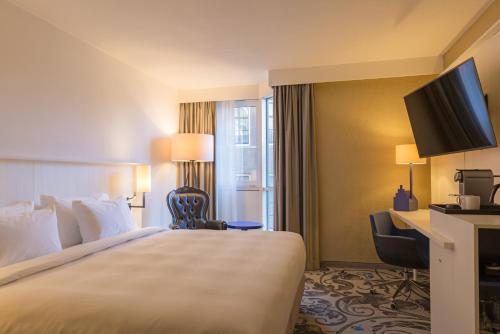 Ένα ή περισσότερα κρεβάτια σε δωμάτιο στο Radisson Blu Hotel, Amsterdam City Center