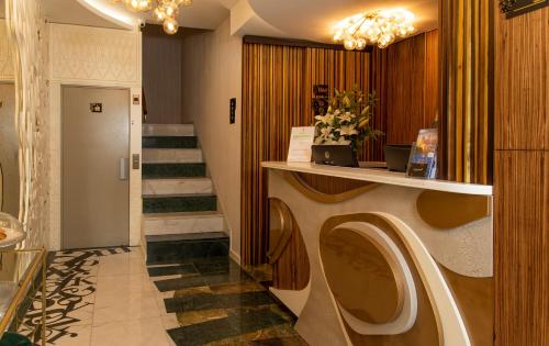 a bathroom with a washing machine and a staircase at Be Poet Baixa Hotel in Lisbon
