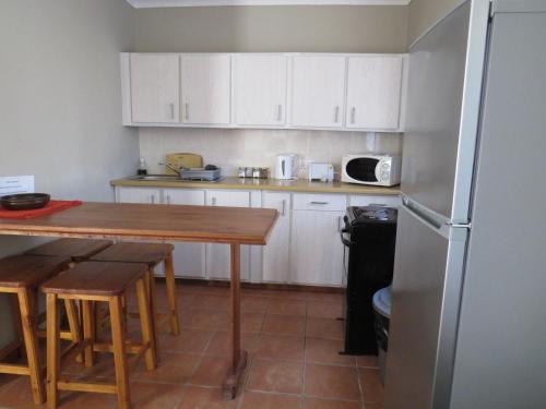 Dapur atau dapur kecil di Haus Victoria Self Catering Cottages