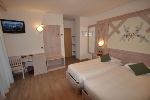 Postel nebo postele na pokoji v ubytování Hotel Select