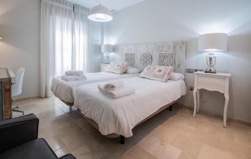 Posteľ alebo postele v izbe v ubytovaní Apartamento Sueño de la Caleta
