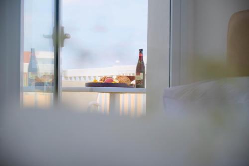 Postel nebo postele na pokoji v ubytování FIG TREE GIANNIS