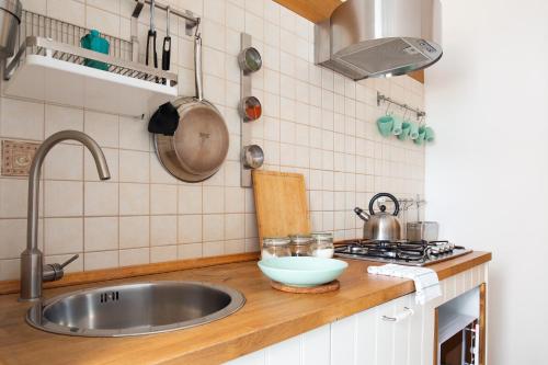 Kuchyň nebo kuchyňský kout v ubytování Isola Blu