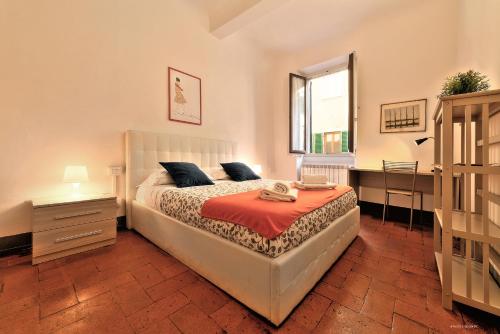 Posteľ alebo postele v izbe v ubytovaní Wine Apartments Florence Colorino