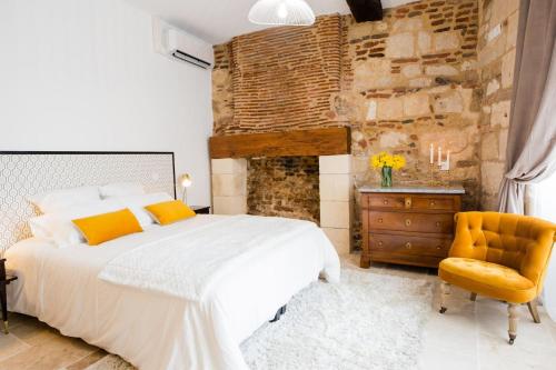 Un ou plusieurs lits dans un hébergement de l'établissement Appartement de charme au coeur de Bergerac