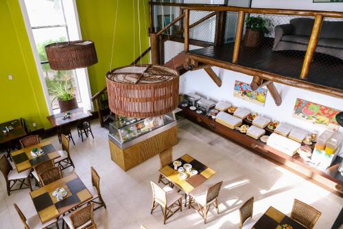 Restoran ili drugo mesto za obedovanje u objektu Porto Suítes Natal Hotel