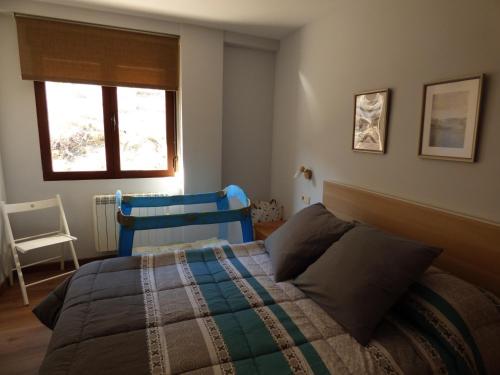 Un pat sau paturi într-o cameră la Apartamento Las Eras