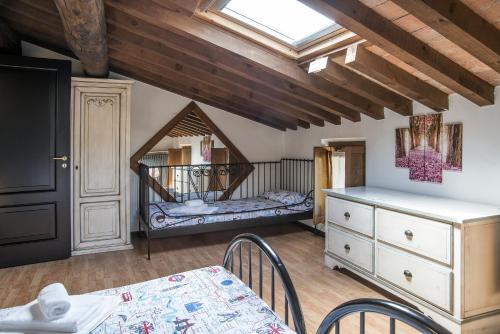En eller flere senge i et værelse på Residence Villa Vinco