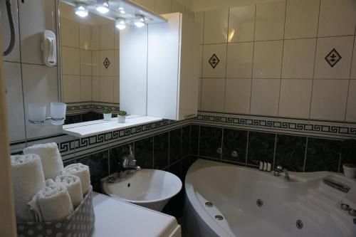 Kúpeľňa v ubytovaní Deluxe Apartman Pervan