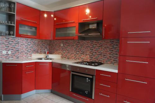Kuchyňa alebo kuchynka v ubytovaní Deluxe Apartman Pervan