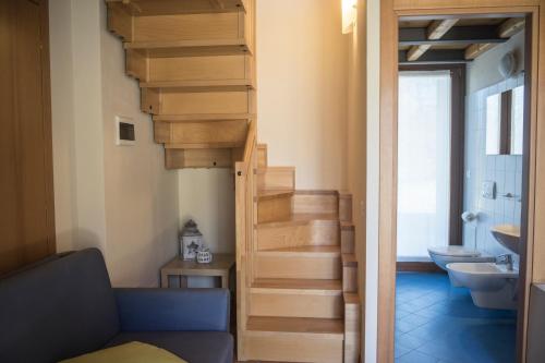 a stairway leading up to a bathroom with a toilet at Agriturismo Il Pianetto in Verona
