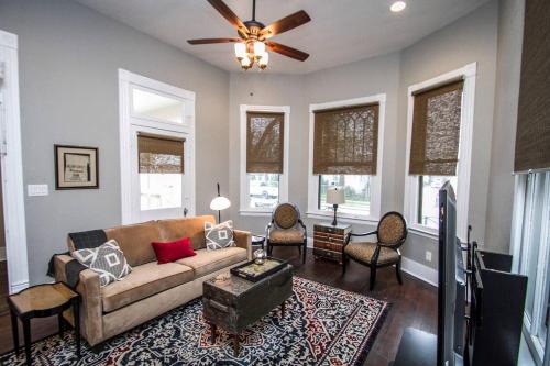 a living room with a couch and chairs at Wyoming St Restored Historic 2BR/1BA Downtown in San Antonio