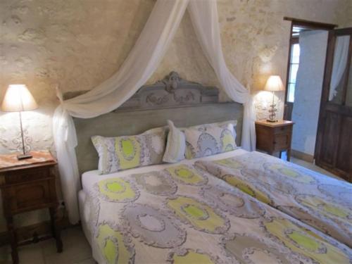 Ένα ή περισσότερα κρεβάτια σε δωμάτιο στο Le Clos de la Garde