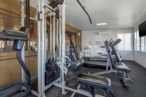 a gym with several tread machines in a room at Comfort Inn & Suites Murrieta Temecula Wine Country in Murrieta