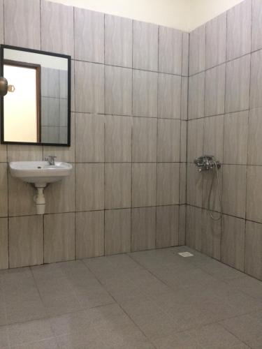 Koupelna v ubytování D'Batur Hotel