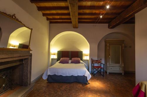 Ліжко або ліжка в номері Sant'Angelo 42