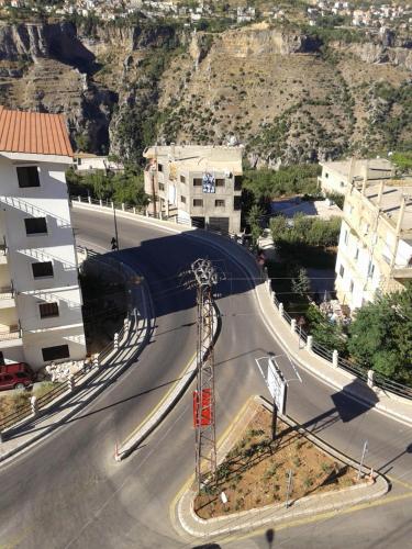 an aerial view of a road in a city at Bauhaus Motel in Bcharré