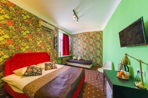 Giường trong phòng chung tại Orange Hotel Chistye Prudy