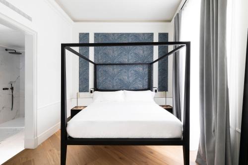 Maldà Singular Hotelにあるベッド