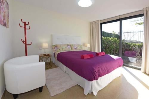 Ένα ή περισσότερα κρεβάτια σε δωμάτιο στο Salobre Las Terrazas 2