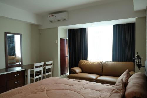 Χώρος καθιστικού στο Lavenderbnb Room 7 at Mataram City