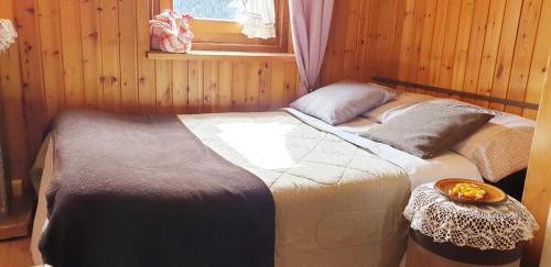 מיטה או מיטות בחדר ב-Civico 10