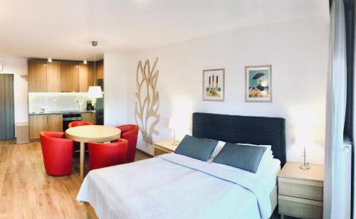 Kuchyň nebo kuchyňský kout v ubytování Apartamenty Rodzinne z ogródkiem