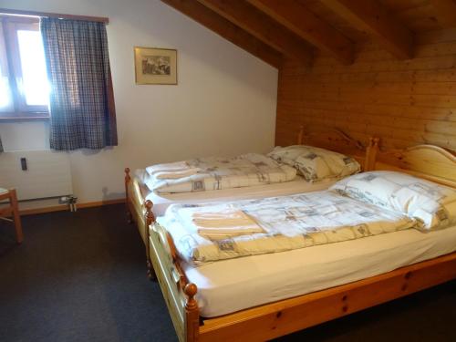 Postel nebo postele na pokoji v ubytování Aragon T101