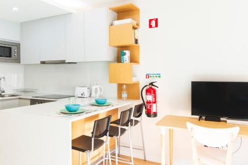 Virtuvė arba virtuvėlė apgyvendinimo įstaigoje APOSENTUS - Cozy Marquês Station Studio