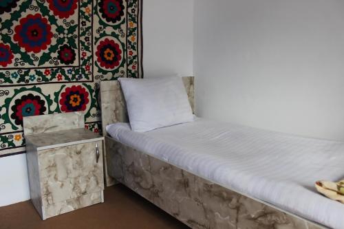 Postel nebo postele na pokoji v ubytování Riad Nur & Tours