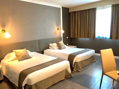 Postel nebo postele na pokoji v ubytování Blue Dream Hotel