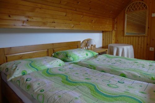 Postel nebo postele na pokoji v ubytování Apartments Zorč