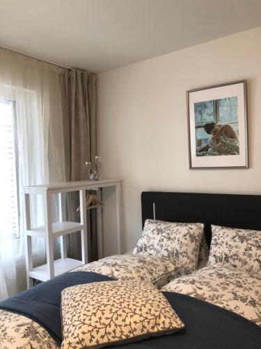 Una cama o camas en una habitación de Happy Vienna Apartment