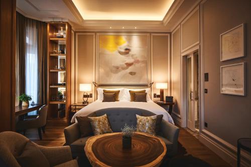 A bed or beds in a room at The Cadogan, A Belmond Hotel, London