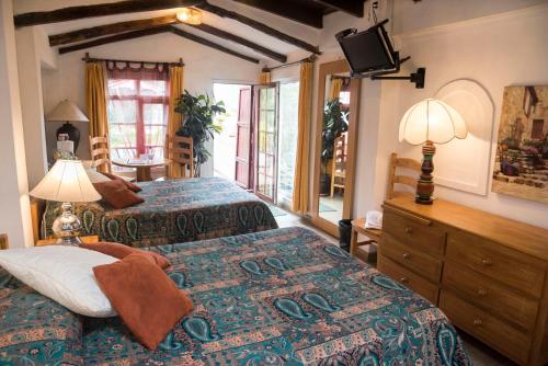 Postel nebo postele na pokoji v ubytování Boutique Hotel Antinea