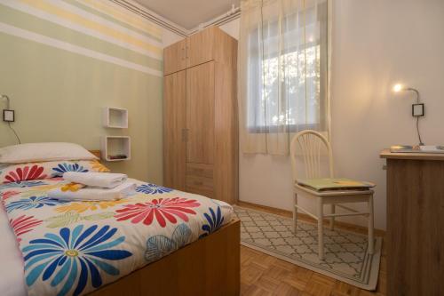 Postel nebo postele na pokoji v ubytování Apartment Steblaj