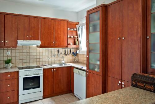 
A kitchen or kitchenette at Mediterranean Apartment by the Sea
